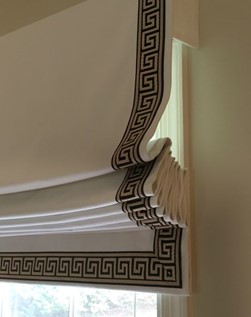 Cream roman blinds with trim